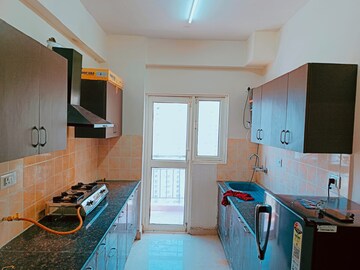Kitchen in 2 BHK Apartment at Sam Palm Olympia, Sector 16c Greater Noida – for Rent