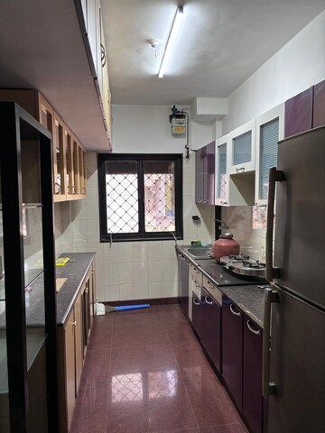 Kitchen in 2 BHK Apartment at Westin Karmayog CHS, Andheri West – for Rent