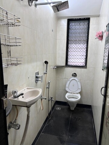 Bathroom in 2 BHK Apartment at Westin Karmayog CHS, Andheri West – for Rent