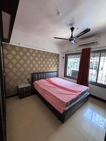 Bedroom in 2 BHK Apartment at Westin Karmayog CHS, Andheri West – for Rent