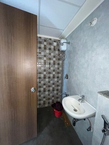 Bathroom in 2 BHK Apartment at Lodha Palava Downtown, Dombivli East – for Rent