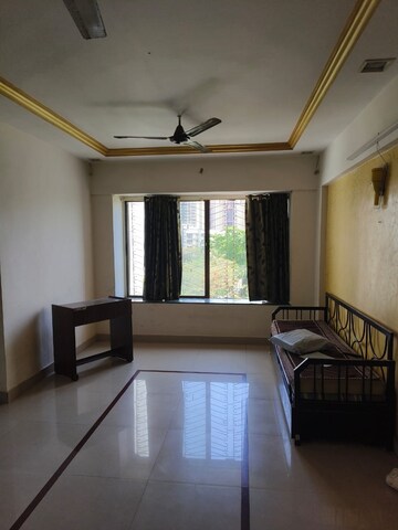 Living Room in 1 RK Apartment at Gardenia CHS, Kandivali East – for Rent