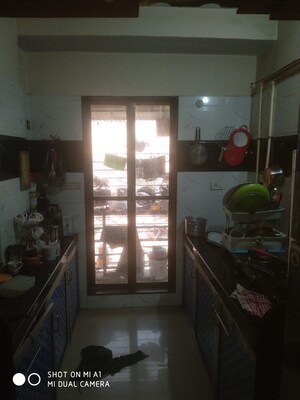 Kitchen in 2 BHK Apartment at Saraswati Tower, Mira Road – for Sale