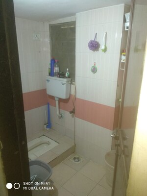 Bathroom in 2 BHK Apartment at Saraswati Tower, Mira Road – for Sale