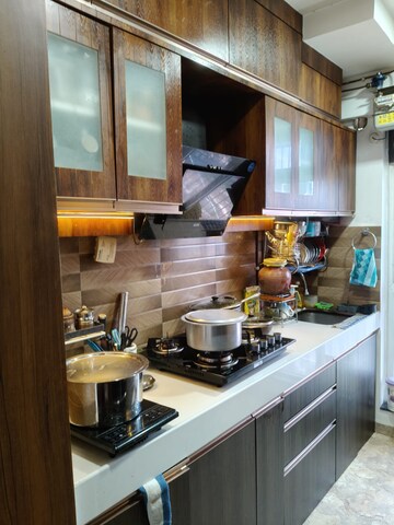 Kitchen in 2 BHK Apartment at Cosmos Jewels, Ghodbunder Road – for Rent