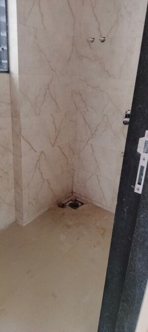 Bathroom in 2 BHK Apartment at Pratham ARC Aura, Andheri West – for Sale