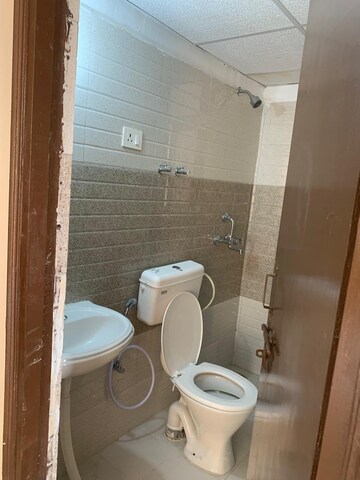 Bathroom in 2 BHK Apartment at Signature Global Orchard Avenue, Sector 93 – for Rent