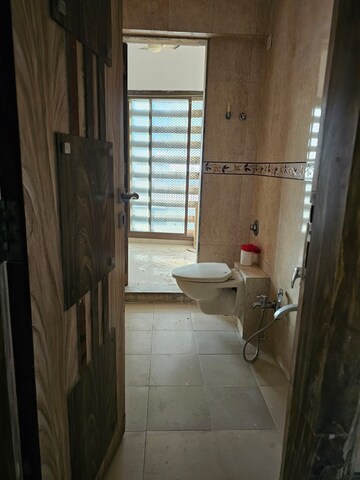 Bathroom in 3 BHK Apartment at Seawoods Sector 36 – for Rent