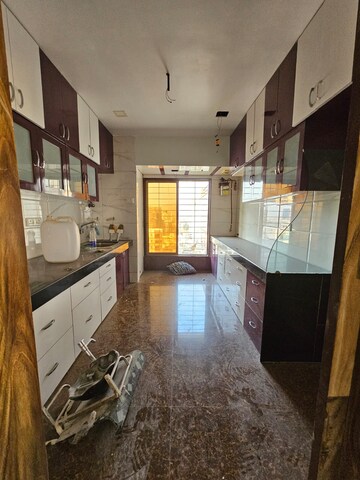 Kitchen in 3 BHK Apartment at Seawoods Sector 36 – for Rent