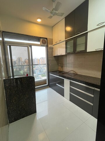 Kitchen in 3 BHK Apartment at Scarlet Seawood Heights, Nerul – for Rent