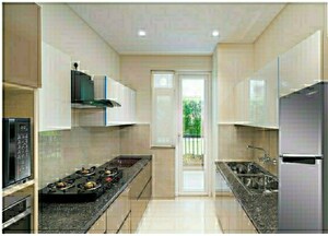 Kitchen in 3 BHK Apartment at Motia Blue Ridge, Dhakoli Village – for Sale