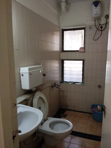 Bathroom in 2 BHK Apartment at Swapna Kiran CHS, Malad East – for Sale