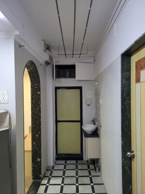 Building Lobby in 3 BHK Apartment at Lalit CHS, Kalwa – for Sale