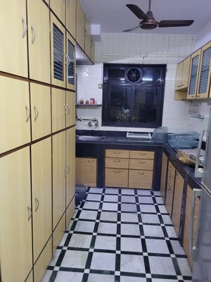 Kitchen in 3 BHK Apartment at Lalit CHS, Kalwa – for Sale