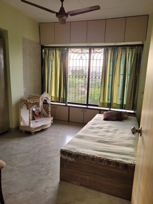 Bedroom in 3 BHK Apartment at Lalit CHS, Kalwa – for Sale