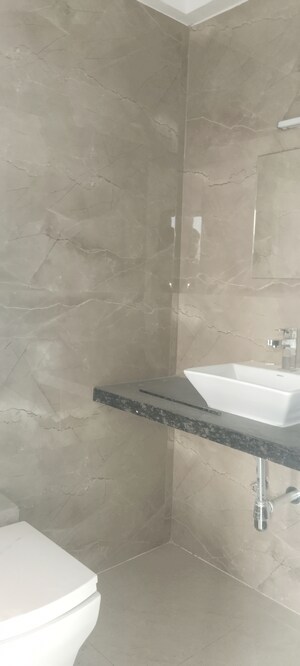 Bathroom in 3 BHK Apartment at New Happy Life CHS, Mulund West – for Sale