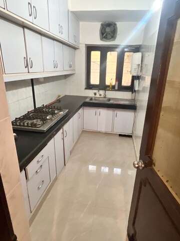 Kitchen in 3 BHK Apartment at Vasant Vihar – for Rent