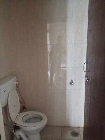 Bathroom in 2 BHK Apartment at Devika Skypers, Raj Nagar Extension – for Sale