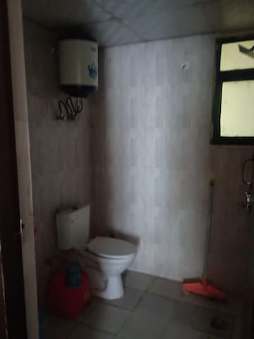Bathroom in 2 BHK Apartment at Devika Skypers, Raj Nagar Extension – for Sale