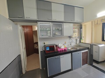 Kitchen in 4 BHK Apartment at Yayati CHS, Seawoods – for Sale
