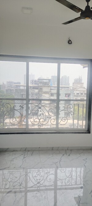 Bedroom in 3 BHK Apartment at New Happy Life CHS, Mulund West – for Sale