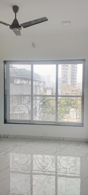 Master Bedroom in 3 BHK Apartment at New Happy Life CHS, Mulund West – for Sale