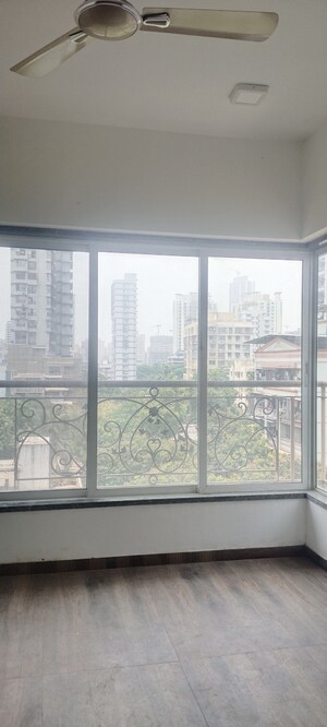 Master Bedroom in 3 BHK Apartment at New Happy Life CHS, Mulund West – for Sale