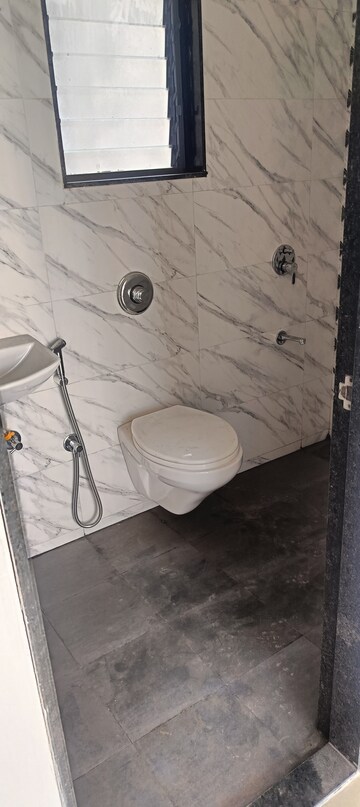 Bathroom in 1 BHK Apartment at UK Iridium, Kandivali East – for Rent