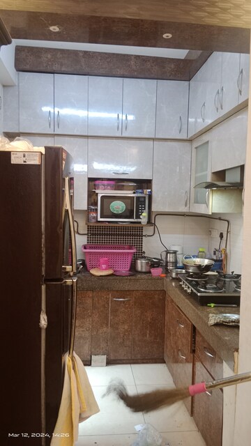 Kitchen in 2 BHK Apartment at Gaur City 2 - 14th Avenue, Sector 16c Greater Noida – for Rent