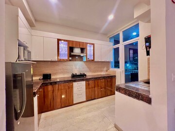 Kitchen in 3 BHK Apartment at Vasundhara Enclave – for Sale