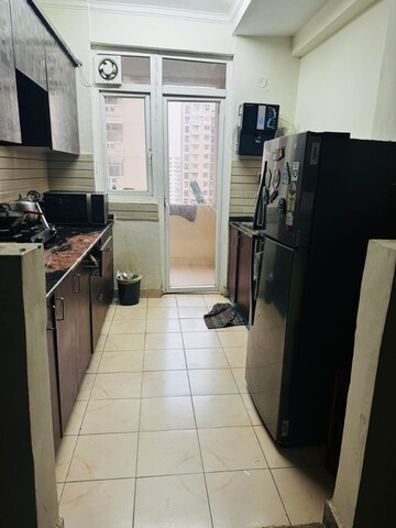 Kitchen in 2.5 BHK Apartment at Amrapali Silicon City, Sector 76 – for Sale