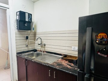 Kitchen in 2.5 BHK Apartment at Amrapali Silicon City, Sector 76 – for Sale