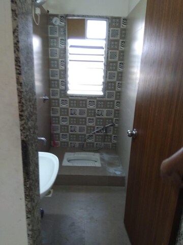 Bathroom in 3 BHK Apartment at Axis Paradigm Whistling Meadows, Paud Road – for Sale