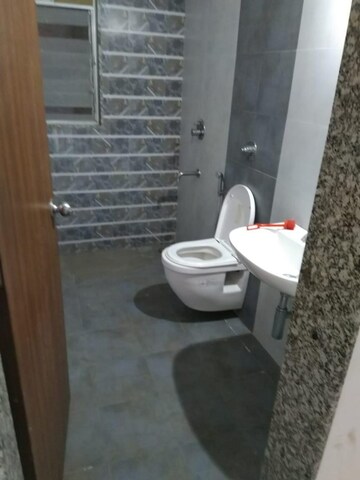 Bathroom in 3 BHK Apartment at Axis Paradigm Whistling Meadows, Paud Road – for Sale