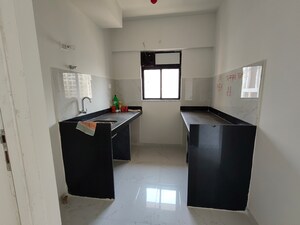 Kitchen in 1 BHK Apartment at Runwal Gardens Phase 2, Dombivli East – for Sale
