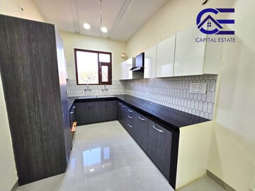 Kitchen in 3 BHK Apartment at Vasundhara Enclave – for Sale