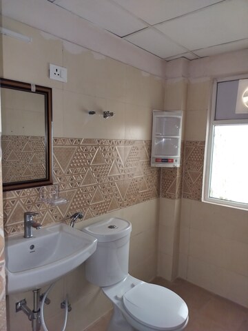 Bathroom in 3 BHK Apartment at Amrapali Golf Homes, Sector 4, Greater Noida – for Rent