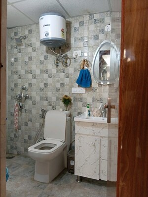 Bathroom in 3 BHK Apartment at Nilaya Greens, Raj Nagar Extension – for Sale