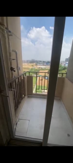 Balcony in 2 BHK Apartment at Signature Global Orchard Avenue, Sector 93 – for Sale