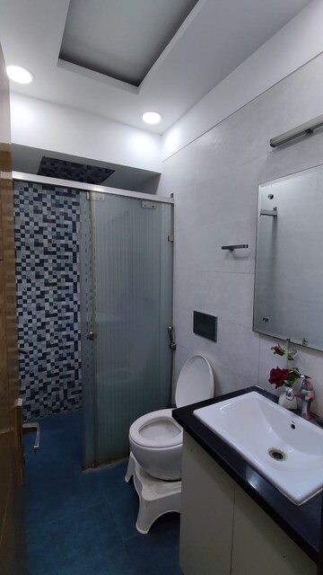 Bathroom in 3 BHK Apartment at Moti Nagar – for Rent