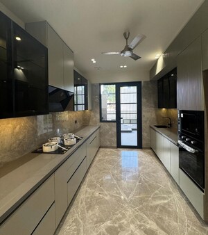 Kitchen in 4 BHK Penthouse at Panchsheel Wellington 2, Dundahera – for Sale