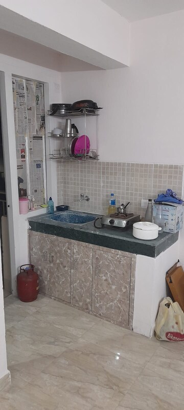 Kitchen in 1 RK Apartment at Emaar Gurgaon Greens, Sector 102 – for Rent