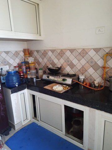 Kitchen in 2 BHK Apartment at Nilaya Greens, Raj Nagar Extension – for Sale
