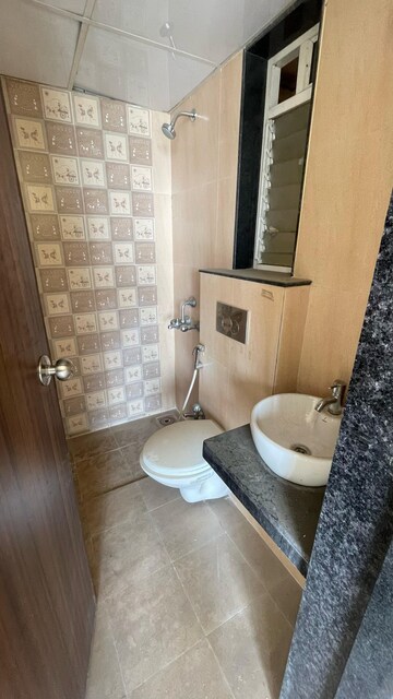 Bathroom in 2 BHK Apartment at Unique Signature Mumbai, Mira Road – for Rent