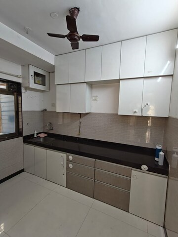 Kitchen in 3 BHK Apartment at Acme Ozone, Manpada – for Rent