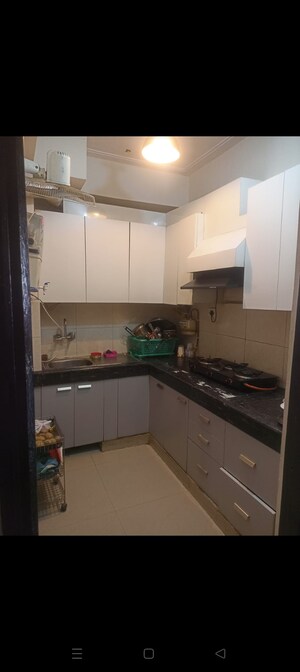 Kitchen in 2 BHK Apartment at Nitishree Aura Chimera, Raj Nagar Extension – for Sale