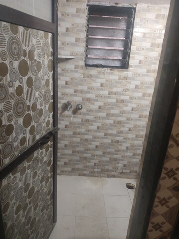 Bathroom in 1 BHK Apartment at Mira Sadan CHS, Mira Road – for Rent