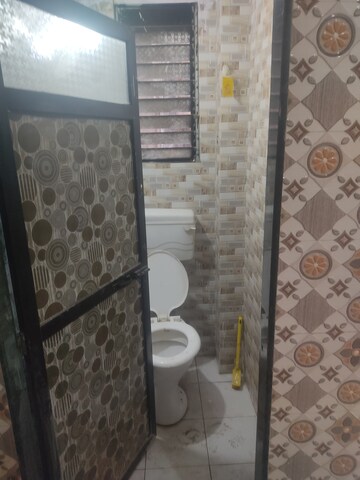 Bathroom in 1 BHK Apartment at Mira Sadan CHS, Mira Road – for Rent