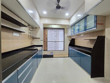 Kitchen in 2 BHK Apartment at NRI Complex Phase I, Seawoods Sector 58 – for Sale