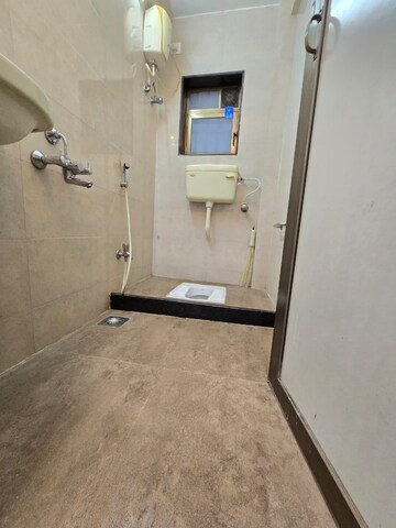 Bathroom in 2 BHK Apartment at NRI Complex Phase I, Seawoods Sector 58 – for Sale